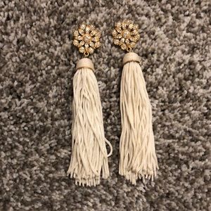 White dangle earrings